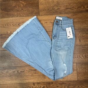 Vibrant Light Blue Distressed Flare Jeans